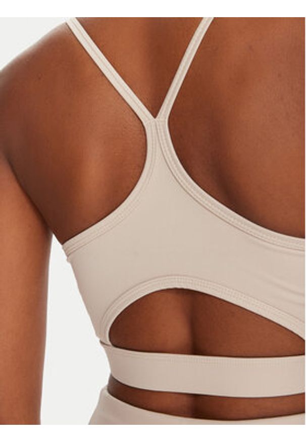 Reebok Biustonosz sportowy Reebok X Ewa Chodakowska RK25312CCW Beżowy. Kolor: beżowy. Materiał: syntetyk