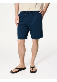 Reserved - Szorty regular fit - granatowy. Kolor: niebieski. Materiał: dzianina, włókno
