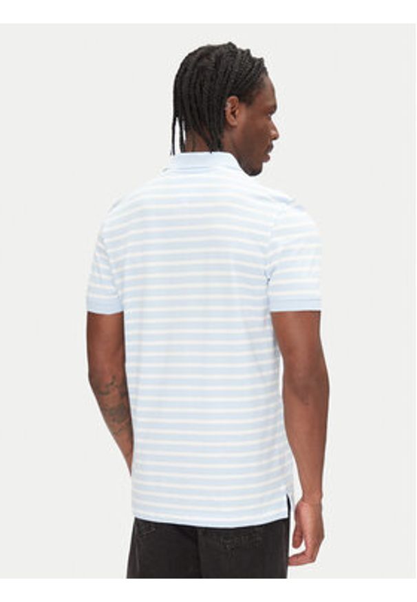 Tommy Jeans Polo DM0DM20676 Błękitny Slim Fit. Typ kołnierza: polo. Kolor: niebieski. Materiał: bawełna