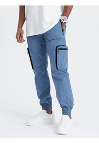 Ombre Clothing - Spodnie męskie JOGGERY z odstającymi i zapinanymi kieszeniami cargo - niebieskie V7 - Rozmiar: L. Kolor: niebieski. Materiał: guma, tkanina, elastan, bawełna. Wzór: nadruk #6