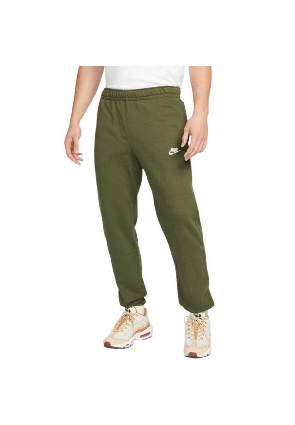 Nike - Spodnie Do Joggingu Męskie Polar NSW Club. Kolor: zielony. Materiał: polar. Sport: bieganie
