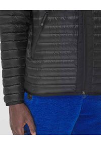 Burberry - BURBERRY - Pikowana kurtka z aplikacją z logo. Kolor: czarny. Materiał: puch, materiał. Wzór: aplikacja