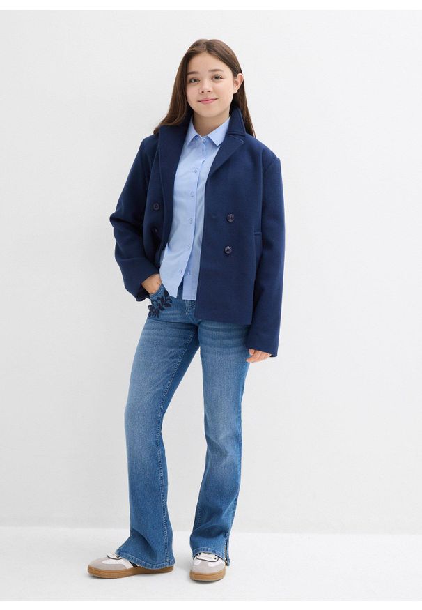 bonprix - Dżinsy bootcut ze średnim stanem. Kolor: niebieski
