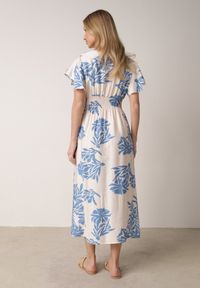 Born2be - Niebieska Wiskozowa Sukienka o Rozkloszowanym Kroju z Kopertowym Dekoltem Morgassa. Okazja: na co dzień. Kolor: niebieski. Materiał: wiskoza. Wzór: kwiaty. Sezon: lato. Typ sukienki: kopertowe. Styl: casual, klasyczny #5