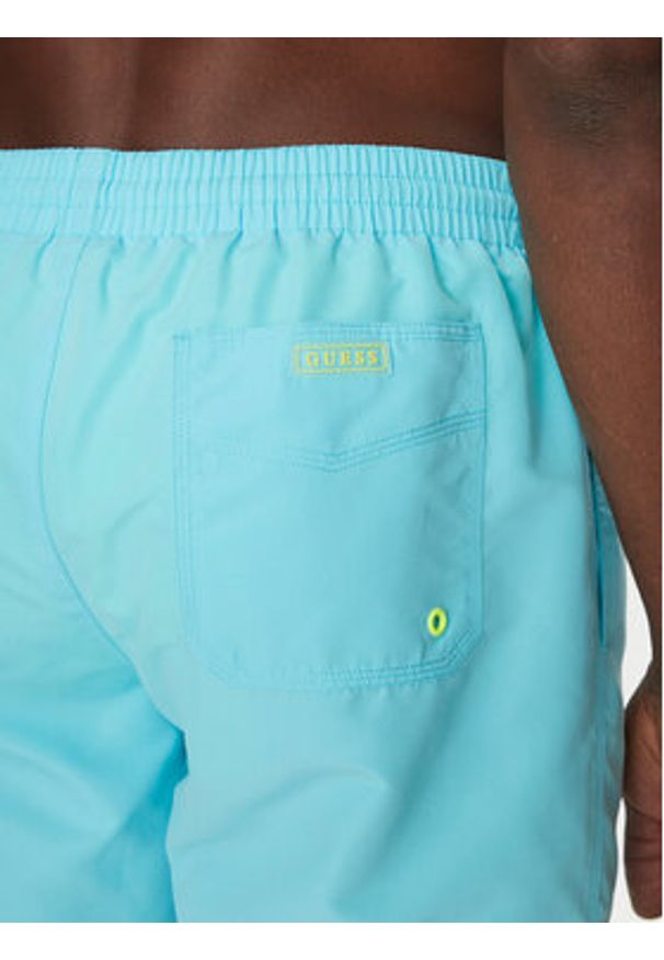 Guess Szorty kąpielowe F4GT03 WG282 Błękitny Regular Fit. Kolor: niebieski. Materiał: syntetyk