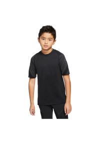 Koszulka dla dzieci Nike Breathe Strike BV9458. Materiał: materiał, poliester. Długość rękawa: krótki rękaw. Technologia: Dri-Fit (Nike). Długość: krótkie #1