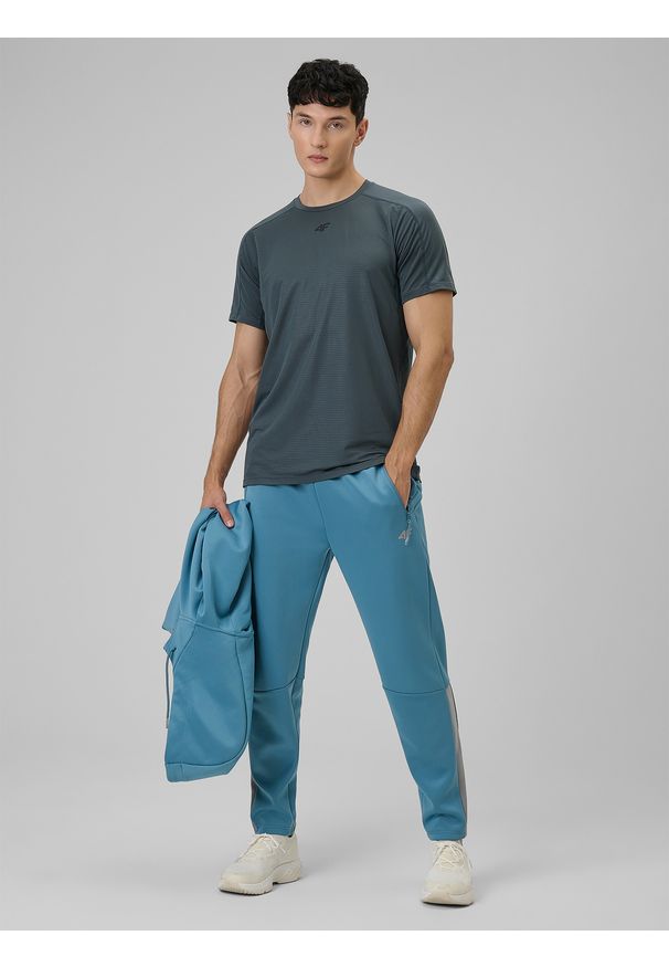 4f - 4F Spodnie treningowe szybkoschnące męskie - granatowe XXL. Kolor: niebieski. Materiał: skóra. Sport: fitness