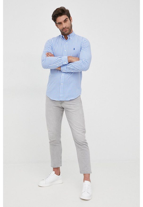 Polo Ralph Lauren koszula męska slim z kołnierzykiem button-down. Typ kołnierza: button down, polo. Kolor: niebieski. Materiał: tkanina. Długość rękawa: długi rękaw. Długość: długie