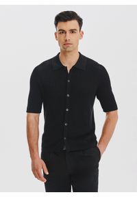 Pako Lorente - PAKO LORENTE - Czarne swetrowe polo z lnem. Okazja: na co dzień. Typ kołnierza: polo. Kolor: czarny. Materiał: len. Długość rękawa: krótki rękaw. Długość: krótkie. Styl: casual #1