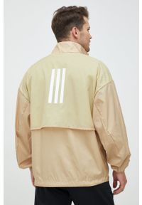 adidas Performance wiatrówka kolor beżowy przejściowa. Okazja: na co dzień. Kolor: beżowy. Materiał: materiał. Styl: casual #5