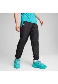 Spodnie dresowe tkane Puma MAPF1. Kolor: czarny. Materiał: dresówka. Styl: sportowy