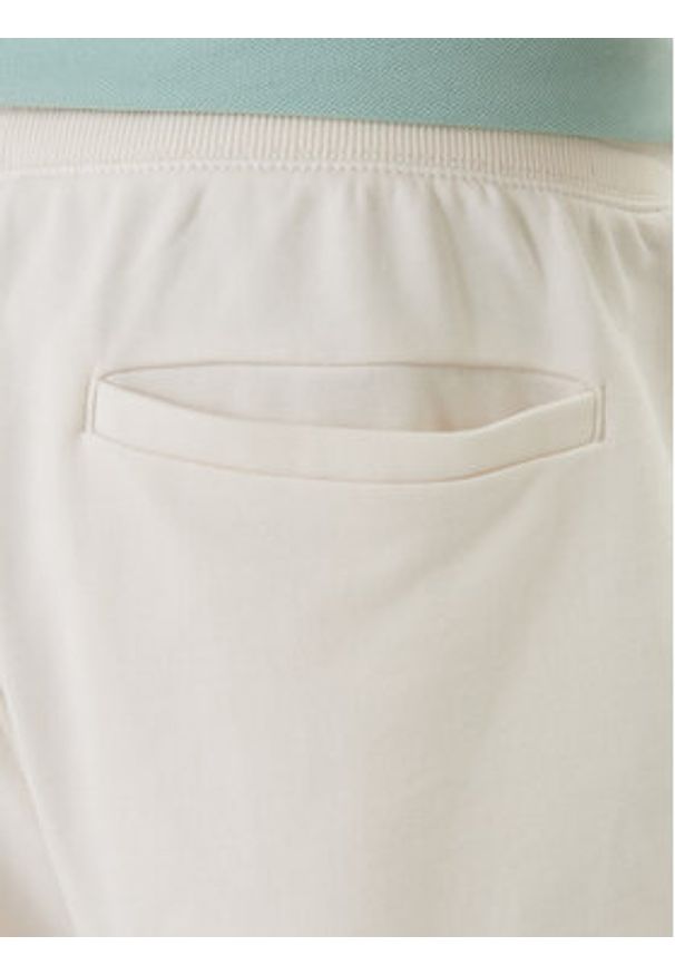 TOMMY HILFIGER - Tommy Hilfiger Szorty materiałowe Essential MW0MW37240 Écru Regular Fit. Kolor: kremowy. Materiał: bawełna