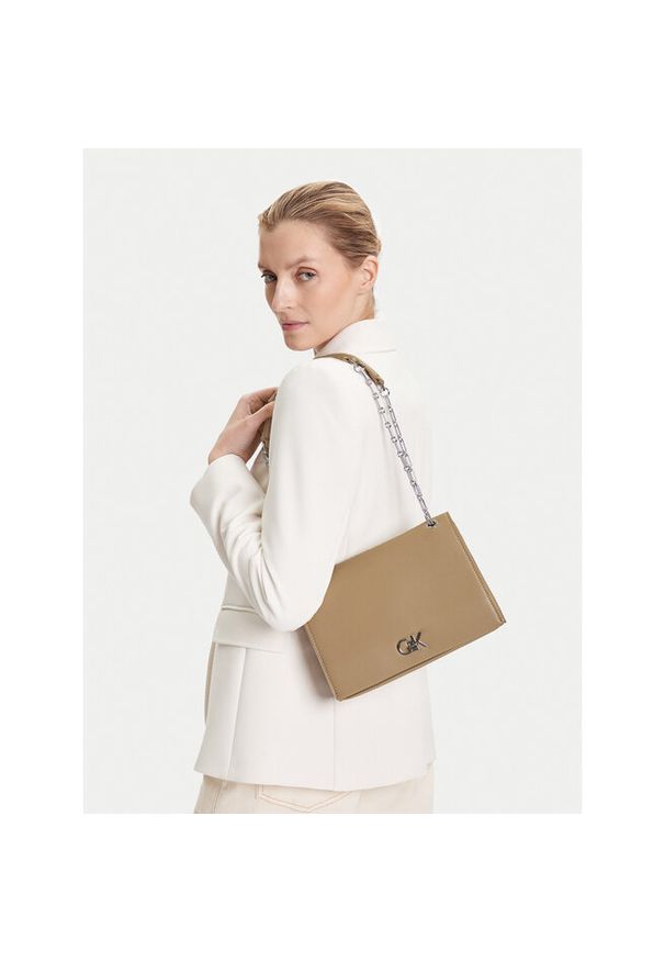 Torebka Calvin Klein. Kolor: beżowy