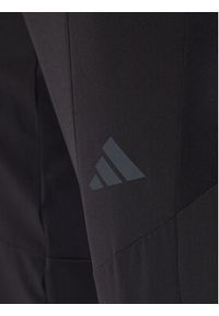 Adidas - adidas Spodnie dresowe Designed for Training Hybrid IY1123 Czarny Slim Fit. Kolor: czarny. Materiał: syntetyk