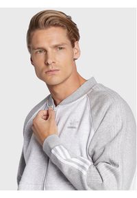 Adidas - adidas Bluza Fleece Sst HI2995 Szary Relaxed Fit. Kolor: szary. Materiał: bawełna