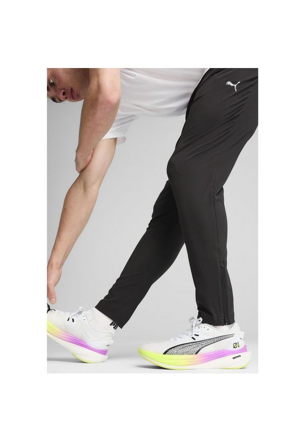 Puma - Męskie spodnie RUN VELOCITY o zwężanym kroju PUMA Black. Kolor: czarny. Sport: bieganie