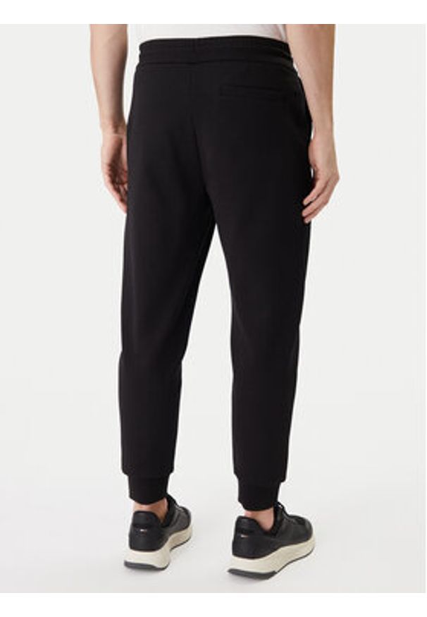 BOSS Spodnie dresowe 50555853 Czarny Regular Fit. Kolor: czarny. Materiał: bawełna