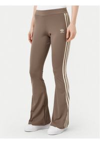 Adidas - adidas Legginsy JD4601 Beżowy Flare Fit. Kolor: beżowy. Materiał: syntetyk #1