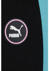 Puma legginsy SWxP damskie kolor czarny wzorzyste. Kolor: czarny. Materiał: dzianina, skóra, bawełna