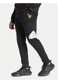Adidas - adidas Spodnie dresowe Future Icons IN3322 Czarny Regular Fit. Kolor: czarny. Materiał: bawełna