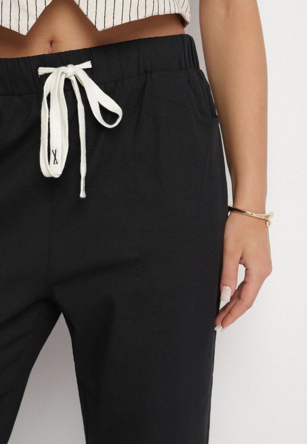 Born2be - Czarne Bawełniane Spodnie z Wiązaniem Galtebis. Okazja: na co dzień. Kolor: czarny. Materiał: bawełna. Styl: elegancki, casual