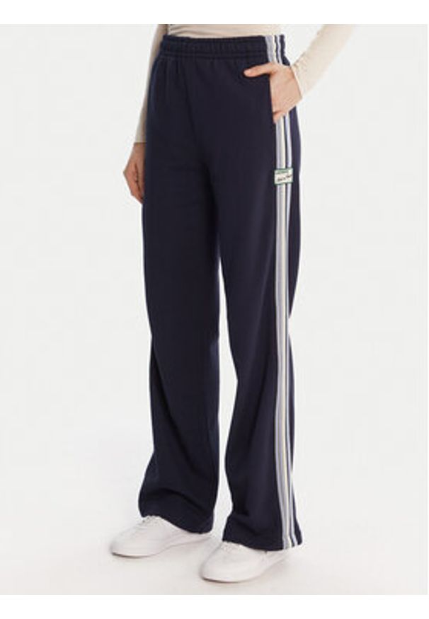 Lacoste Spodnie dresowe XF5250 Granatowy Regular Fit. Kolor: niebieski. Materiał: bawełna