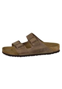 Klapki damskie Birkenstock Arizona. Zapięcie: klamry. Kolor: beżowy. Materiał: materiał. Szerokość cholewki: normalna. Sport: turystyka piesza