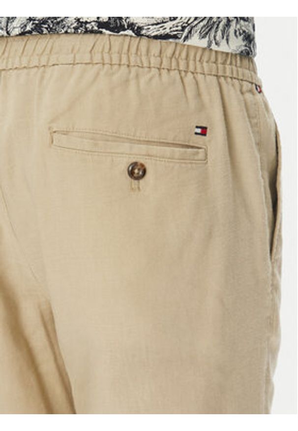 TOMMY HILFIGER - Tommy Hilfiger Spodnie materiałowe Harlem MW0MW38801 Beżowy Slim Fit. Kolor: beżowy. Materiał: len