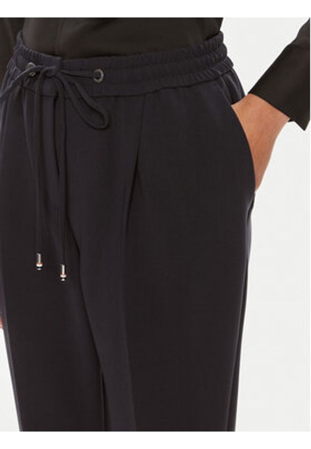 BOSS - Boss Spodnie materiałowe Tariyanah 50490039 Granatowy Regular Fit. Kolor: niebieski. Materiał: syntetyk