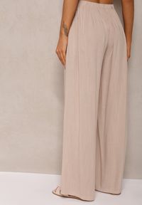 Renee - Jasnobeżowe Szerokie Spodnie High Waist z Gumką w Talii Ilnena. Okazja: na co dzień. Stan: podwyższony. Kolor: beżowy. Styl: klasyczny, casual, elegancki