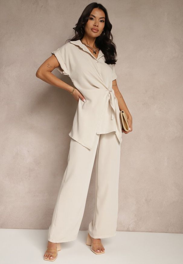 Renee - Beżowy Komplet ze Spodniami o Szerokim Kroju i Koszulą z Ozdobnym Wiązaniem Filaniella. Kolor: beżowy