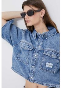 Calvin Klein Jeans koszula jeansowa damska kolor niebieski relaxed z kołnierzykiem klasycznym. Typ kołnierza: kołnierzyk klasyczny. Kolor: niebieski. Materiał: bawełna, denim. Długość rękawa: krótki rękaw. Długość: krótkie. Styl: klasyczny #1