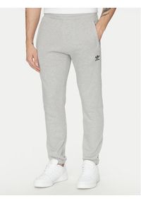 Adidas - adidas Spodnie dresowe Trefoil Essentials JD2424 Szary Slim Fit. Kolor: szary. Materiał: bawełna