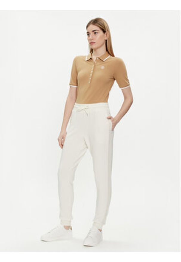 TOMMY HILFIGER - Tommy Hilfiger Spodnie dresowe UW0UW04785 Écru Regular Fit. Materiał: dresówka