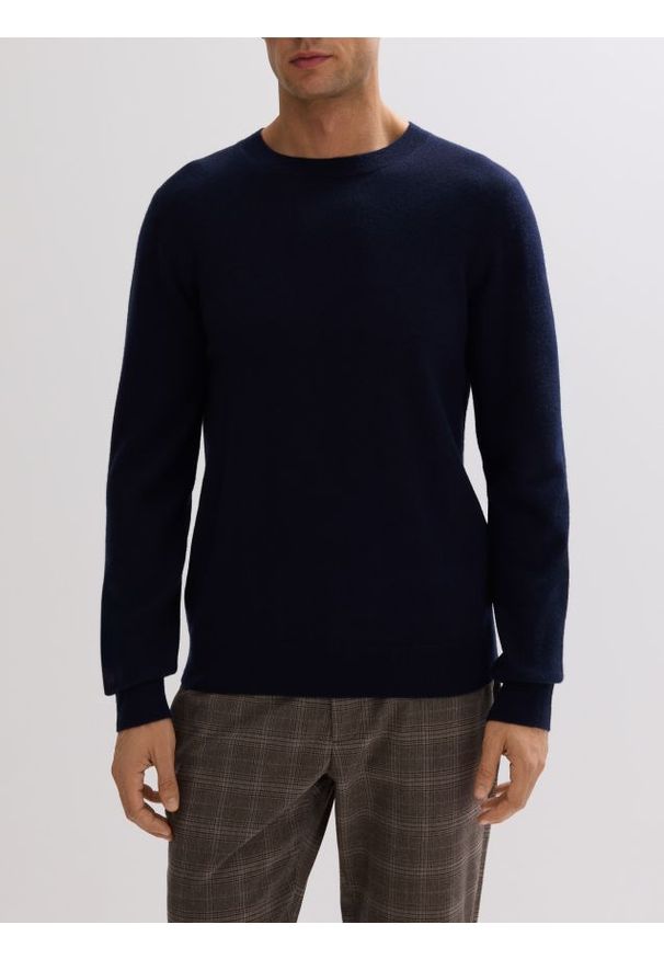 Reserved - Sweter z wełny merino - granatowy. Kolor: niebieski. Materiał: wełna