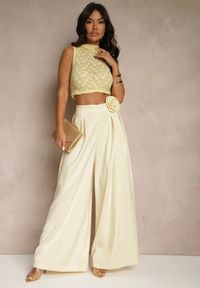 Renee - Żółte Spodnie o Szerokim Kroju High Waist z Kwiatem 3D Firalisse. Okazja: na co dzień. Stan: podwyższony. Kolor: żółty. Wzór: kwiaty. Styl: klasyczny, elegancki, casual