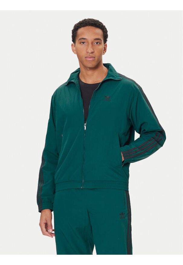 Adidas - adidas Bluza adicolor Woven Firebird JY1329 Zielony Loose Fit. Kolor: zielony. Materiał: syntetyk