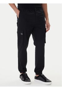 Calvin Klein Jeans Joggery Comfort LV04RD608G Czarny Skinny Fit. Kolor: czarny. Materiał: bawełna #1