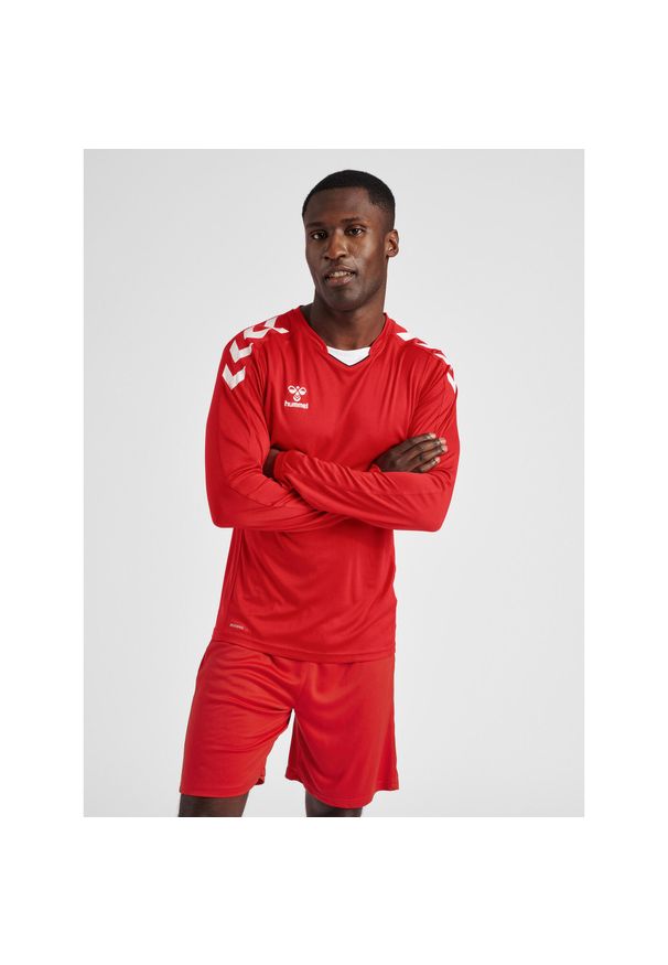 Jersey Hummel hmlCore. Kolor: wielokolorowy, czerwony, różowy. Materiał: jersey. Długość rękawa: długi rękaw. Długość: długie. Sport: piłka nożna