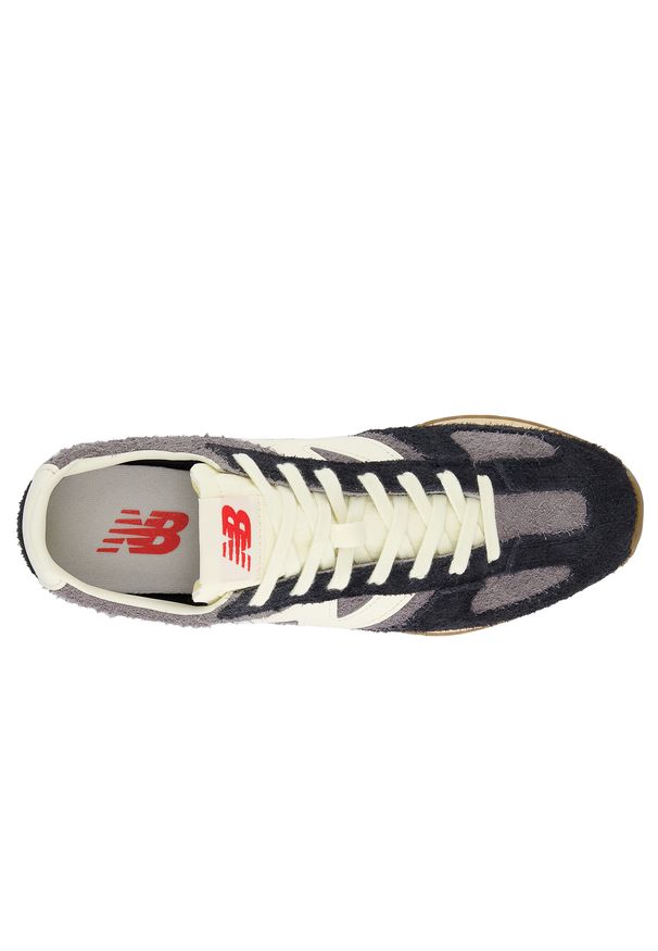 Buty unisex New Balance U471PSD – czarne. Kolor: czarny. Materiał: syntetyk, zamsz, materiał. Szerokość cholewki: normalna. Wzór: jodełka. Sezon: lato