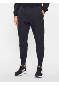 Adidas - adidas Spodnie dresowe IN5102 Czarny Regular Fit. Kolor: czarny. Materiał: bawełna #1