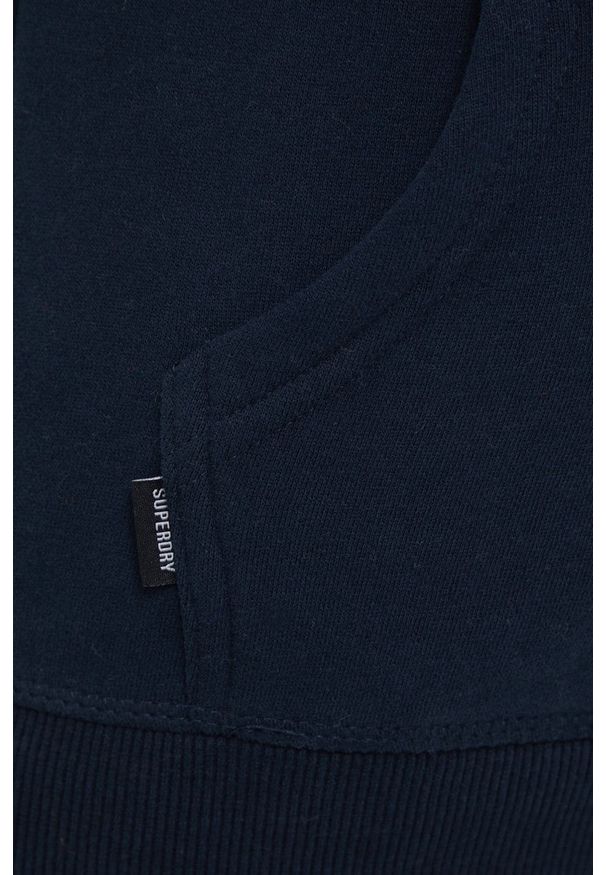 Superdry Bluza damska kolor granatowy z kapturem gładka. Okazja: na co dzień. Typ kołnierza: kaptur. Kolor: niebieski. Materiał: dzianina, bawełna. Wzór: gładki. Styl: casual
