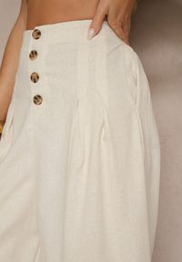 Renee - Beżowe Spodnie Culottes High Waist z Bawełny Zdobione Guzikami Izuma. Okazja: na co dzień. Stan: podwyższony. Kolor: beżowy. Materiał: bawełna. Wzór: aplikacja. Styl: casual, elegancki
