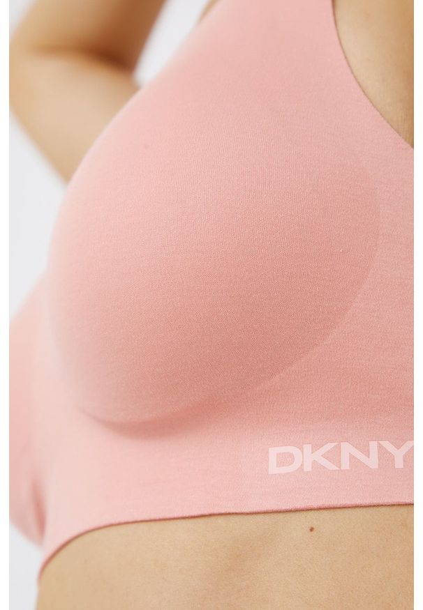 DKNY - Dkny - Biustonosz. Kolor: różowy. Materiał: dzianina. Rodzaj stanika: odpinane ramiączka, wyciągane miseczki. Wzór: gładki