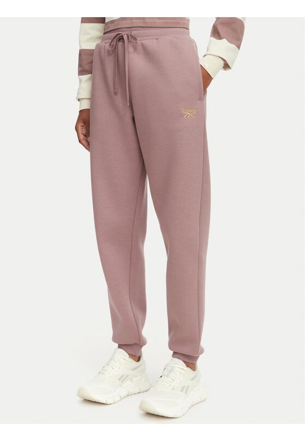 Reebok Spodnie dresowe Zana RK25690CC Brązowy Regular Fit. Kolor: brązowy. Materiał: syntetyk