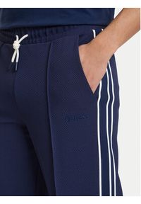 Guess Spodnie dresowe Z6GB14 K3211 Granatowy Regular Fit. Kolor: niebieski. Materiał: syntetyk #3
