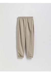 Reserved - Bawełniane spodnie jogger - beżowy. Kolor: beżowy. Materiał: bawełna