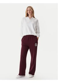 TOMMY HILFIGER - Tommy Hilfiger Spodnie dresowe UW0UW06081 Bordowy Wide Leg. Kolor: czerwony. Materiał: bawełna #4