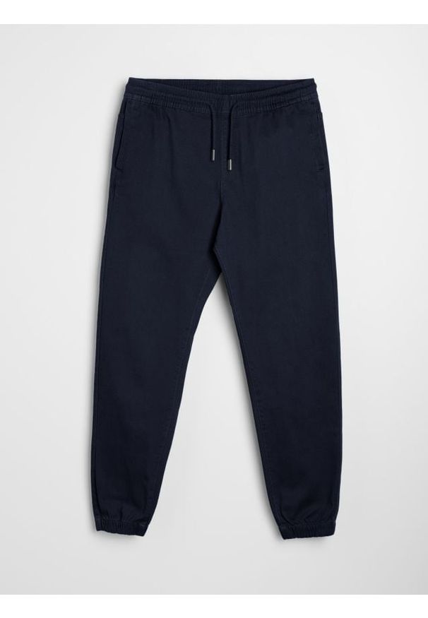 Sinsay - Spodnie jogger - granatowy. Kolor: niebieski