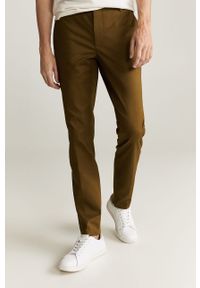 Mango Man - Spodnie Dublin. Kolor: brązowy. Materiał: tkanina, bawełna, materiał, elastan. Wzór: gładki #1